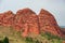 Jeti-Ã–gÃ¼z Rocks In Kyrgyzstan. Jety-Oguz gorge Canyon, cliffs of seven bulls. Red rocks, erosion in clay, cloudy sky and steppe