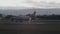 Jetstar Jetliner Landing an Airport Runway