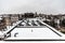 Jette, Belgium view over old and new residential roofs, covered with snow