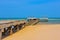 Jetty boat sea sand blue sky