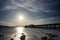 Jetty in broad daylight with cloudy sky