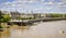 Jetty on the Garonne river lined with historic buildings in Bordeaux, France