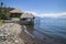 Jetty hut with straw roof at the coast of lake Atitlan at Santa Cruz La Laguna, Guatemala