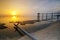 Jetty at Jeram Beach during sunset