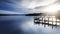 Jetty at lake Starnberger See, Germany, with sun