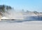 Jetty in lake in winter