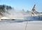 Jetty in lake in winter