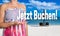 Jetzt buchen (in german book now) concept is presented by woman