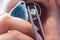 Jeweler looking at precious stone through a loupe