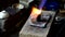 Jeweler melts gold in a liquid state in a crucible. Craft jewelery 4k footage