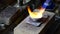 Jeweler melts gold in liquid state in crucible. Craft jewelery 4k resolution