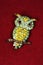 Jewelled owl brooch.