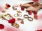Jewelry earring rings set for women white pearl accessories handbag stylish shoes for women set and red roses background conc