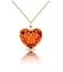 jewelry gold pendant heart made of ruby gemstone on a chain with reflection