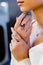 In a jewelry store, a close-up shot captures a girl& x27;s hand showcasing a stunning and valuable ring made of diamonds