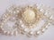 Jewelry, white pearl necklace and brooch