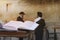 Jewish bible on table, wailing western wall, jerusalem, israel. book of the Torah-the Pentateuch of Moses is open on the prayer