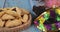 Jewish carnival Purim celebration on hamantaschen cookies, noisemaker and mask with parchment