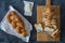 Jewish challah bread, sliced on black background