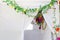 Jewish festival of Sukkot. Traditional succah (hut) from white fabric and colorful decorations