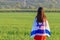 Jewish girl with flag of Israel on amazing landscape in beautiful summer.