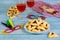 Jewish hamantashen cookies, mask, wine and megillah papyrus roll