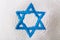 Jewish hat with Israeli Star of David. Famous souvenir jewish headgear. Judaism concept.