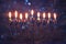 jewish holiday Hanukkah background with menorah & x28;traditional candelabra& x29; and burning candles