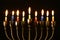 jewish holiday Hanukkah background with menorah & x28;traditional candelabra& x29; and burning candles