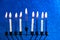 Jewish holiday Hanukkah concept. Menorah - traditional candelabrum or hanukkiah with lights and candles