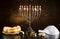 Jewish Holiday Hanukkah With Menorah, Torah, Donuts And Wooden D