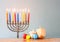 Jewish holiday Hanukkah with menorah wooden dreidels (spinning top).