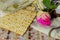 Jewish holiday, Holiday symbol, jewish matzo bread on a table with flowers