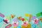 Jewish holiday Purim background with cute paper clowns characters and hamantaschen cookies