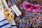 Jewish holiday Purim with carnival mask and hamantaschen cookies. Flat lay