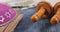 Jewish holidays in a synagogue prayer items with prayer shawl tallit shofar, torah scroll on soft focus