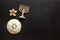 Jewish Kippah Yarmulkes hats with Star of David with menorah. Religion Judaisim symbols on black table. Top view, space