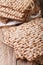 Jewish kosher matzah macro on a table. Vertical