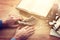 Jewish man hands next to Prayer book, praying, next to tallit. Jewish traditional symbols. Rosh hashanah jewish New Year holiday