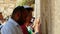 Jewish man pray at the Western Wall in Jerusalem