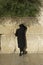 A jewish man is praying in Jerusalem