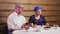 Jewish married couple a wife in a headdress and a man in a kippah evening dinner