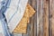 Jewish matzah bread with tallit on wooden background. Passover holiday concept