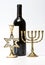 The Jewish menorah, candlestick and bottle of wine