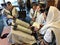 Jewish people reading from the Torah