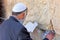 Jewish reading and praying at the western wall