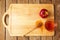 Jewish Rosh Hashana (New Year) holiday background with apples and honey on wooden board. View from above