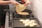 Jewish woman hands preparing traditional Moroccan Moufleta at home