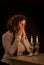 Jewish Woman Prays Over Sabbath Candles