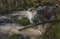 Jezerni creek in autumn color morning with wild waterfall after rainfall